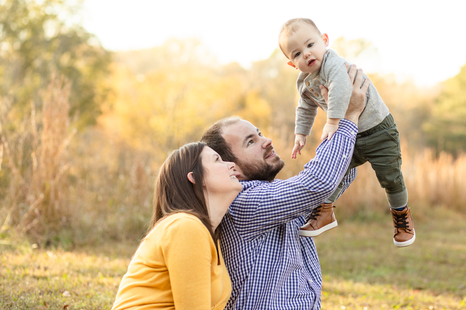 Family having fun with baby | Jade Alexandria Photography | Fall Family Session at Madison County Lake Gurley Alabama