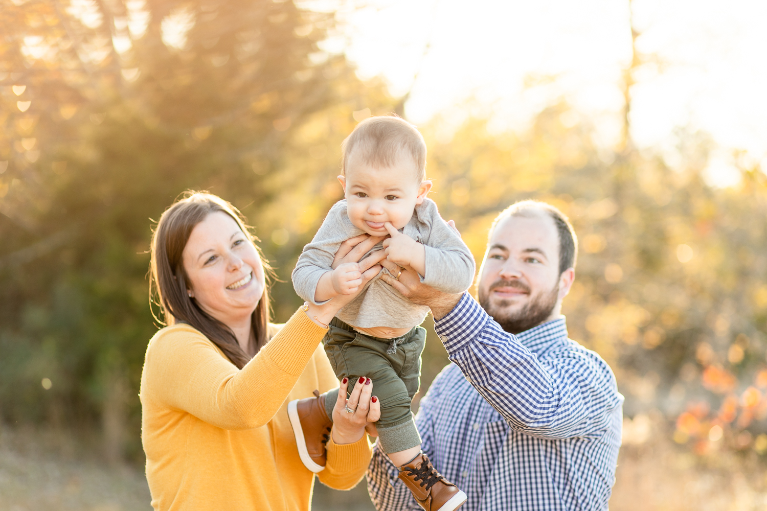 Parents playing with baby boy | Jade Alexandria Photography | Fall family session Madison County Lake Gurley Alabama