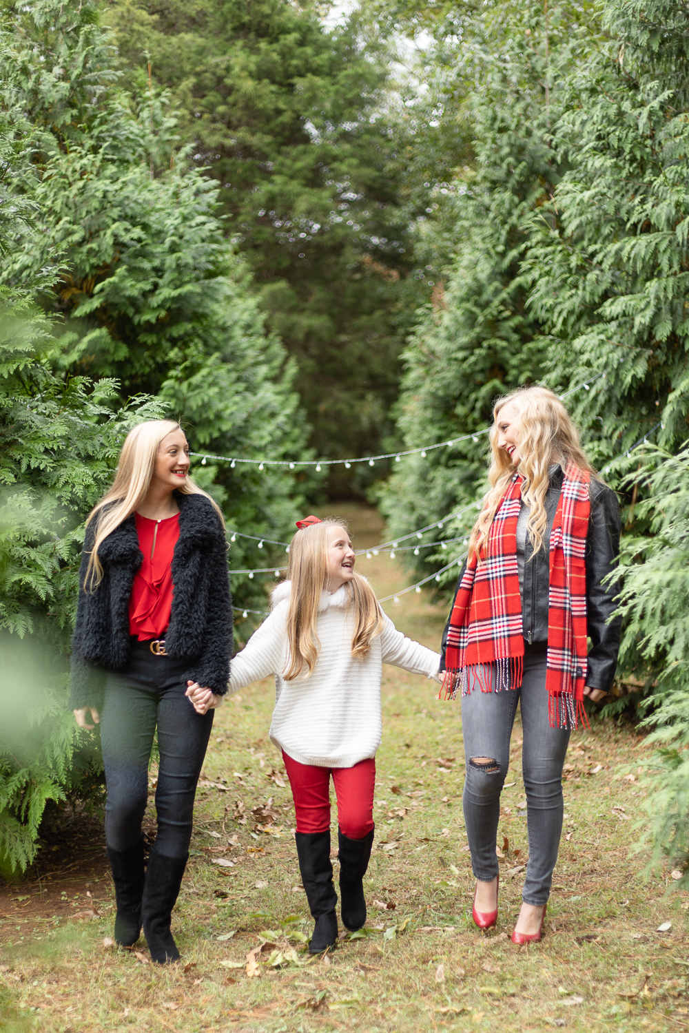 Christmas Mini Session | Sisters walking through Christmas trees | Jade Alexandrai Photography, Huntsville, Alabama Portrait Photographer